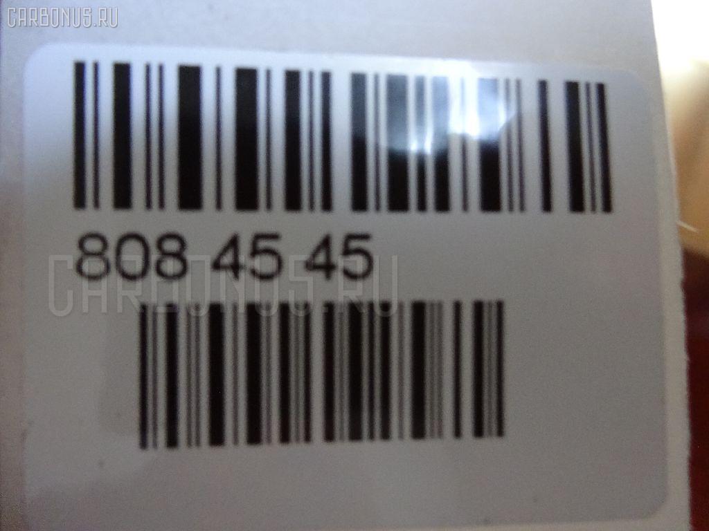 Рулевой карданчик 45260-20457 на Toyota ST215G Фото 4