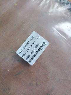 Тросик стояночного тормоза 46430-12300 на Toyota Corolla AE100 Фото 4