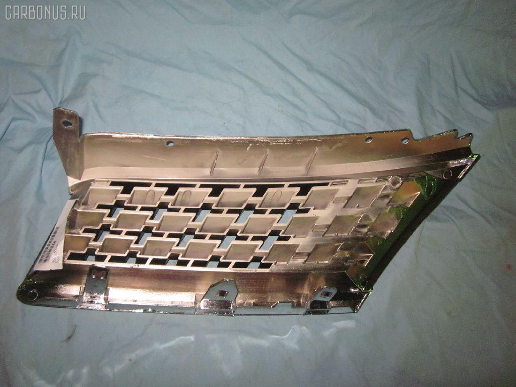 Решетка радиатора TYG DS07286GAR, 62320-ED000 на Nissan Tiida C11 Фото 1