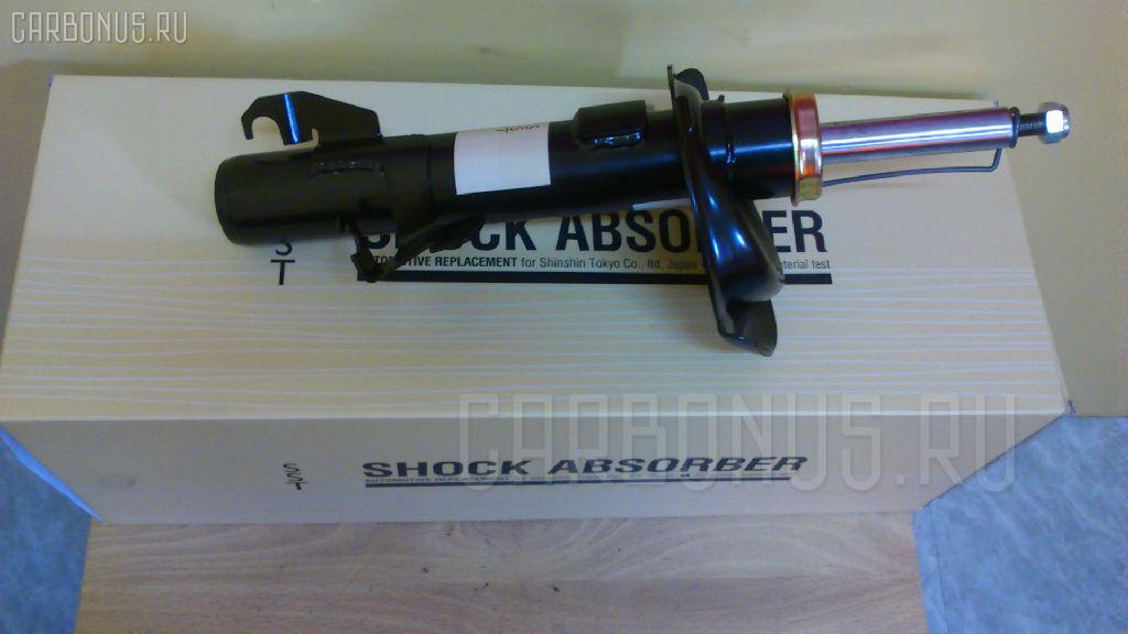 Стойка амортизатора SST ST-049FL-CR3W, 110499, 316 326, 32-V18-A, 334701, B32T34900C, B32T34900D, B32T34900E, B39D34900A, BBM2-34-900C, BBM234900A, BBM234900B, BBM3-34-900C, BBM334900A, BBM334900B, BBP834900, BBP834900A, BFF434900, BFF434900B, BN9A34900, BP4K34900E, BP4K34900F, BP4K34900G, BP4L34900, BP4T34900, BP6J34900, BR5G34900B, BR5S34900A, BR5V34900A, BR5V34900B, BR5V900C, BRY034900, BS1A34900, BWEC-34-900B, C23634900A, C23634900B, C23634900C, CC2934900, CC3034900C, CC3034900D, CD8534900, CD8534900A, CR-049FL-CR3W, CR8972, SJ-049FL-CR3W, SST0019 на Mazda Premacy CR3W Фото 1