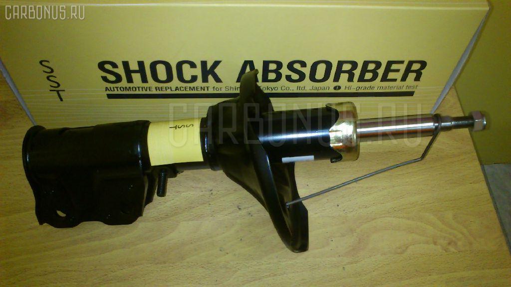 Стойка амортизатора SST ST-049FR-BHA7P, 333292, B16G34700A, BC8W34700F, BVBC34700A, BVBE34700A, BVT634700A, ST-049-9925 на Mitsubishi Lancer CA4A Фото 1
