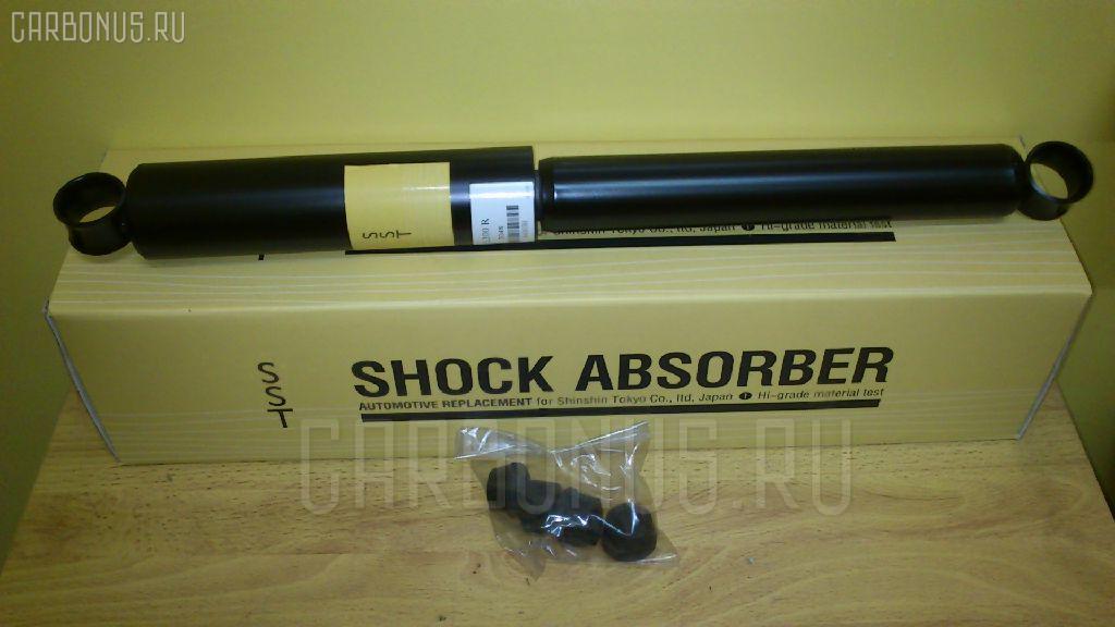 Амортизатор SST ST-003R-L032W, 139128700, 139128700A, 139199281, 2048, 343030, 443089, 448836011, 4853128010, 4853128020, 4853129325, 4853129335, 4853129875, 553049, 898228700, 91106693, E2048, JM06647, MB002706, MB002706A, MB002707, MB002881, MB110467, MB111058, MB515567, MJM06647, ST-003-4785 на Mitsubishi Delica Truck L032W Фото 1