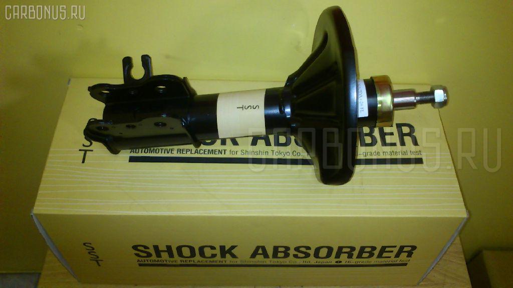 Стойка амортизатора SST ST-049FL-GD8A, 334083, 634045, G04S34900?, GA2B34900A, GA2K34900B, ST-049-2289 на Mazda Capella GD8A Фото 3