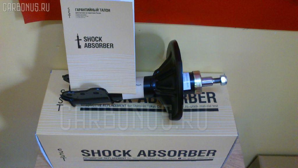 Стойка амортизатора SST ST-049FL-GD8A, 334083, 634045, G04S34900?, GA2B34900A, GA2K34900B, ST-049-2289 на Mazda Capella GD8A Фото 2
