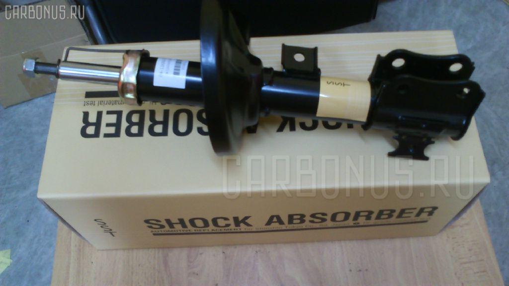 Стойка амортизатора SST ST-049FL-SX, 333432, ST-049-8652 на Suzuki Aerio SX Фото 1