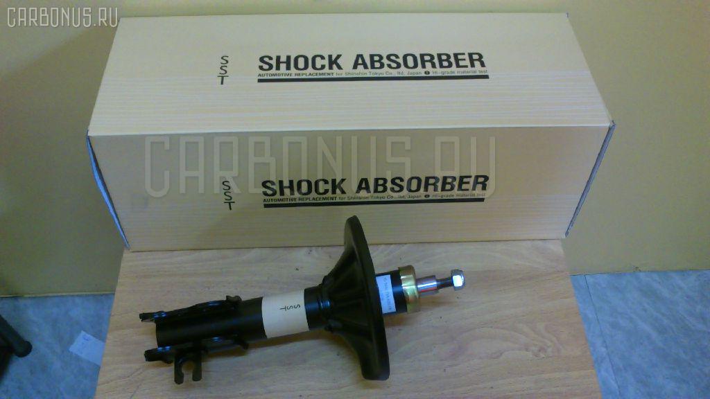 Стойка амортизатора SST ST-049FR-GD8A, 334082, 634044, G04S34700, GA2B34700A, GA2K34700B на Mazda Capella GDEP Фото 2