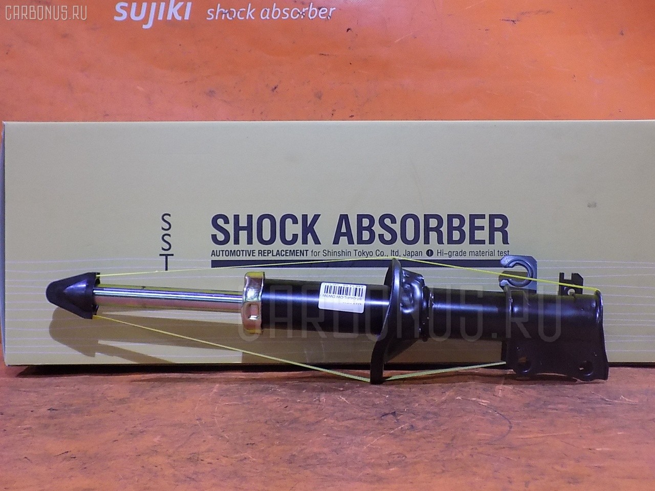 Стойка амортизатора SST ST-049FL-DW, 280 697, 30-B10-A, 333267, CR-049FL-DW, CR8902, DC2034900, DC2037900, DC2234900, DC3534900, DC3734900, SST0045 на Mazda Demio DW3W Фото 1