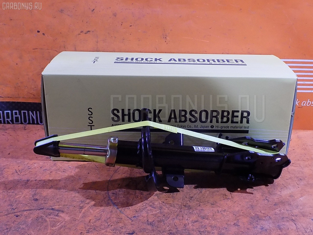 Стойка амортизатора SST ST-049FL-DE3FS, 333495, D04A-34-900C, D651-34-900D, D651-34-900G, DF71-34-900F на Mazda Demio DE3FS Фото 1