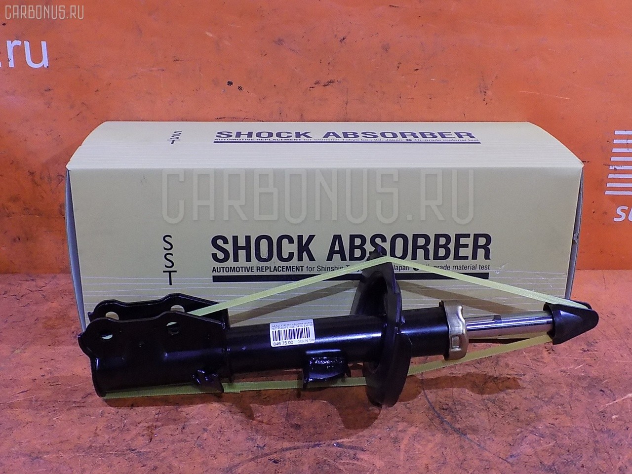 Стойка амортизатора SST ST-049FL-DE3FS, 333495, D04A-34-900C, D651-34-900D, D651-34-900G, DF71-34-900F на Mazda Demio DE3FS Фото 1