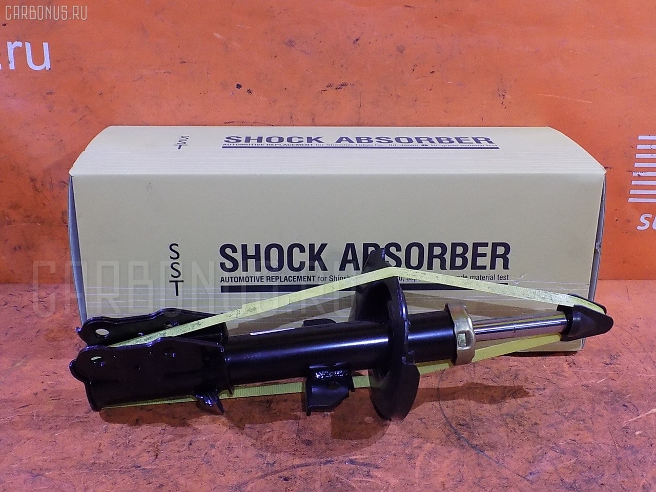 Стойка амортизатора SST ST-049FL-DE3FS, 333495, D04A-34-900C, D651-34-900D, D651-34-900G, DF71-34-900F на Mazda Demio DE3FS Фото 1