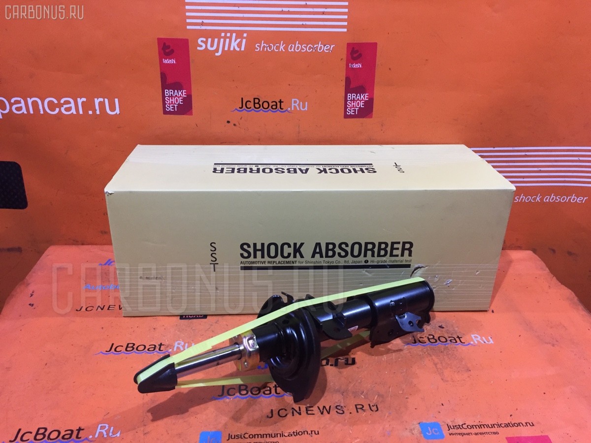 Стойка амортизатора SST ST-049FR-DE3FS, 333494, D04A-34-700C, D651-34-700D, DF71-34-700B, DF71-34-700F на Mazda Demio DE3FS Фото 1