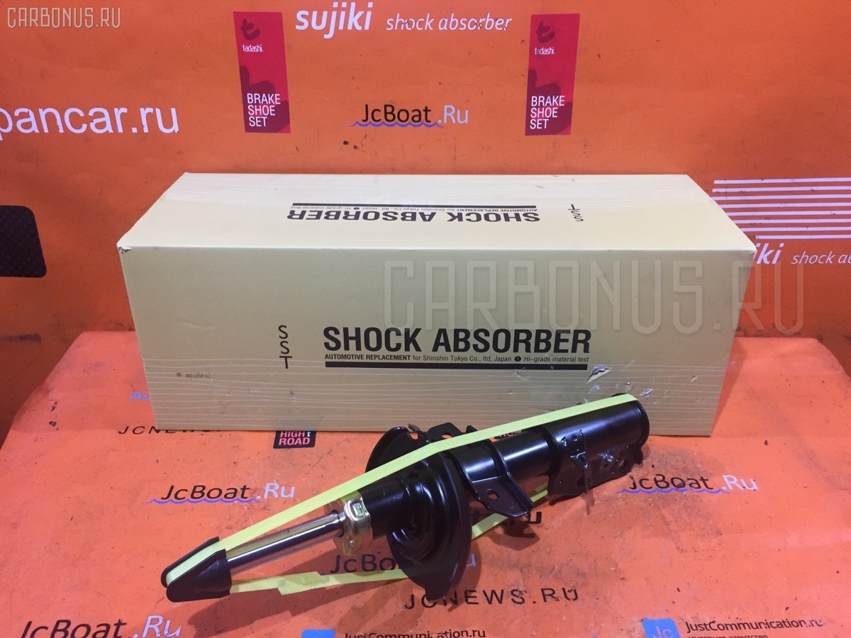 Стойка амортизатора SST ST-049FL-DE3FS, 333495, D04A-34-900C, D651-34-900D, D651-34-900G, DF71-34-900F на Mazda Demio DE3FS Фото 1