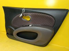 Обшивка двери на Nissan March AK12 Фото 2
