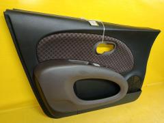 Обшивка двери на Nissan March AK12 Фото 6