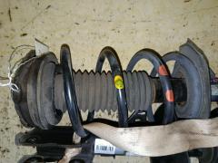 Стойка амортизатора 54302-1VA1A, 54303-1VA1A на Nissan Serena FC26 MR20DD Фото 4