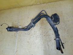 Заливная горловина топливного бака на Toyota Ractis NCP100 1NZ-FE Фото 6