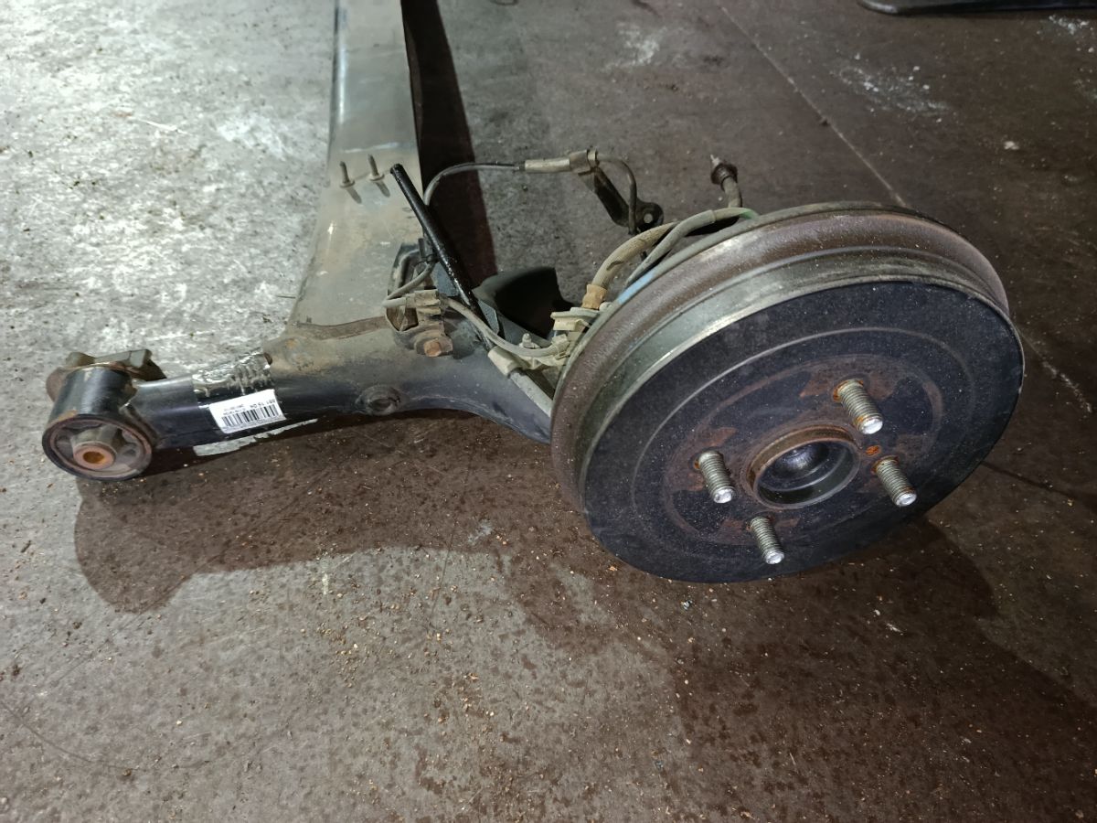 Балка подвески на Toyota Funcargo NCP21 1NZ-FE Фото 9