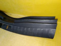 Обшивка багажника 64716-52160 на Toyota Ractis NCP120 Фото 6