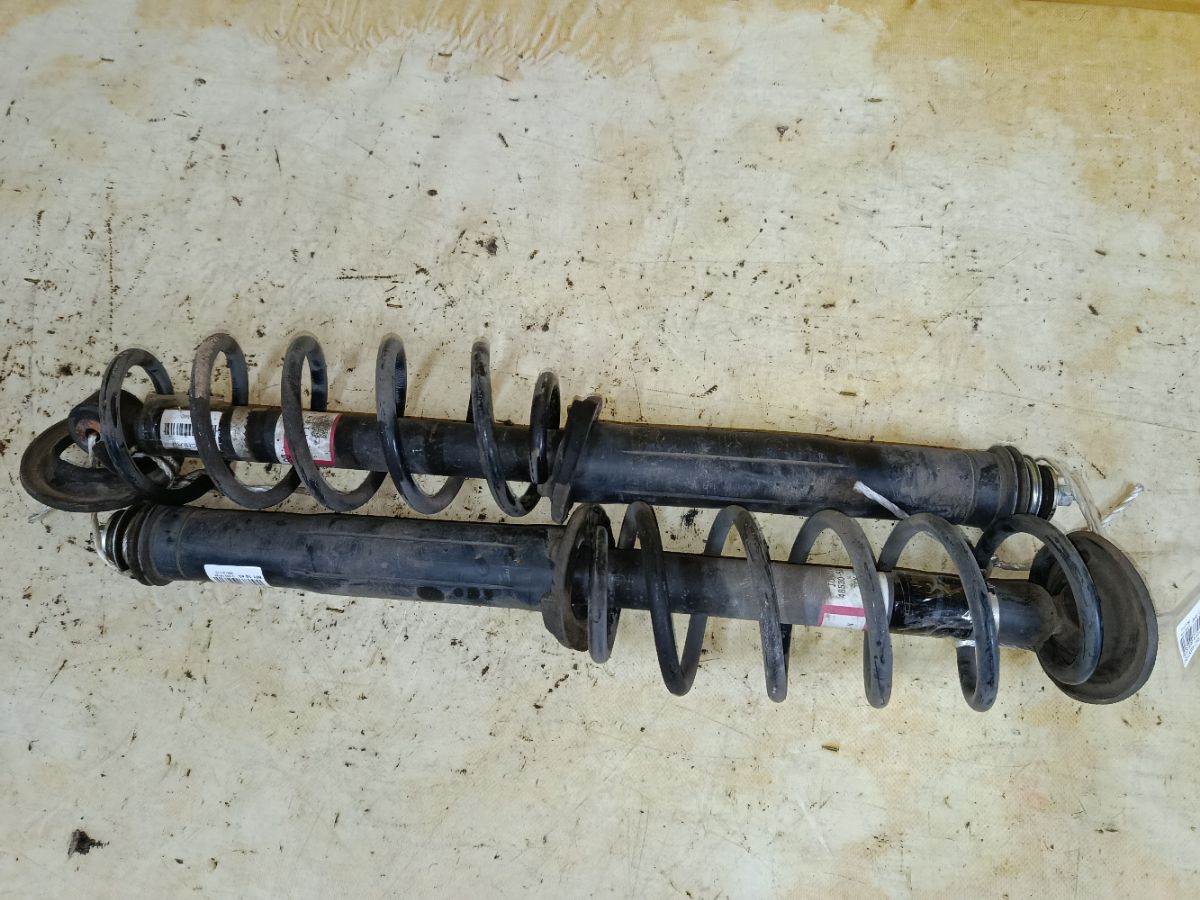 Амортизатор 48530-52D50 на Toyota Ractis NCP120 Фото 3