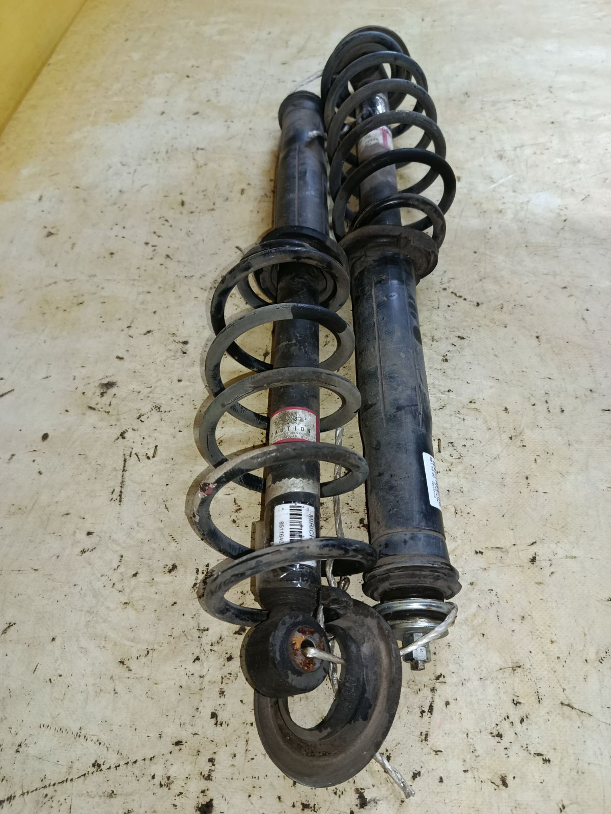 Амортизатор 48530-52D50 на Toyota Ractis NCP120 Фото 7