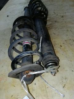 Амортизатор 48530-52D50 на Toyota Ractis NCP120 Фото 4