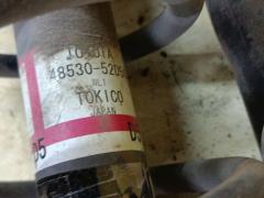 Амортизатор 48530-52D50 на Toyota Ractis NCP120 Фото 6