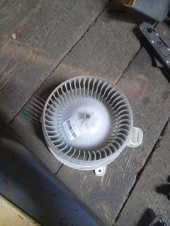 Мотор печки 87103-30400 на Toyota Mark X GRX130 Фото 7