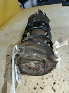 Стойка амортизатора 333391, 54303 ED025, 54303 ED50B, 54303CJ40C, 54303CJ41C, 54303ED001, 54303ED501, 54303ED50A, 54303ED525, 54303EE50B, 54303EE90A, 54303EF80A, 54303EM01A, 54303EM30C, CR-049-2726, CR-049FL-C11, E4303 EC80A, E4303 EE90A, E4303 EL00A, E4303 EM01A, E4303EM30C, SJ-049-2726, SJ-049FL-C11, ST-049-2726 на Nissan Tiida C11 HR15DE Фото 4