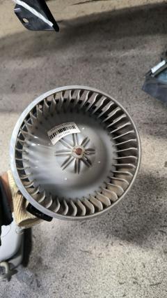 Мотор печки 87103-12050 на Toyota Caldina AZT241W Фото 6