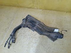 Заливная горловина топливного бака на Toyota Ractis NCP100 1NZ-FE Фото 3