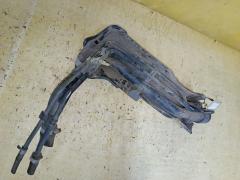 Заливная горловина топливного бака на Toyota Ractis NCP100 1NZ-FE Фото 4