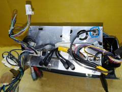 Автомагнитофон B8260-79990 на Nissan March YK12 Фото 10