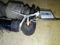 Амортизатор на Nissan Note E11 Фото 5