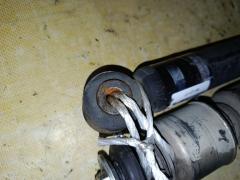 Амортизатор на Nissan Note E11 Фото 7