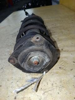 Стойка амортизатора 333391, 54303 ED025, 54303 ED50B, 54303CJ40C, 54303CJ41C, 54303ED001, 54303ED501, 54303ED50A, 54303ED525, 54303EE50B, 54303EE90A, 54303EF80A, 54303EM01A, 54303EM30C, CR-049-2726, CR-049FL-C11, E4303 EC80A, E4303 EE90A, E4303 EL00A, E4303 EM01A, E4303EM30C, SJ-049-2726, SJ-049FL-C11, ST-049-2726 на Nissan Tiida C11 HR15DE Фото 4