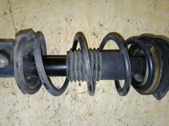 Стойка амортизатора 333391, 54303 ED025, 54303 ED50B, 54303CJ40C, 54303CJ41C, 54303ED001, 54303ED501, 54303ED50A, 54303ED525, 54303EE50B, 54303EE90A, 54303EF80A, 54303EM01A, 54303EM30C, CR-049-2726, CR-049FL-C11, E4303 EC80A, E4303 EE90A, E4303 EL00A, E4303 EM01A, E4303EM30C, SJ-049-2726, SJ-049FL-C11, ST-049-2726 на Nissan Tiida C11 HR15DE Фото 5