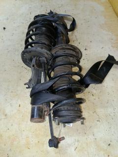 Стойка амортизатора на Mazda Verisa DC5W ZY-VE Фото 4