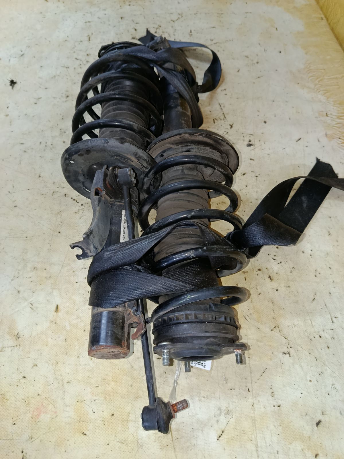 Стойка амортизатора на Mazda Verisa DC5W ZY-VE Фото 4