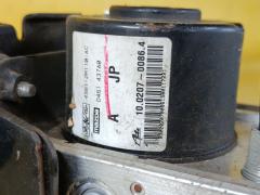 Блок ABS D461-437A0 на Mazda Verisa DC5W ZY-VE Фото 7