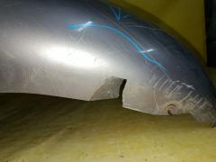 Бампер A1001 A1001,62022-1A6** на Nissan March AK12 Фото 13