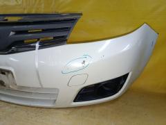 Бампер A1001 A1001,62022-1A6** на Nissan March AK12 Фото 21