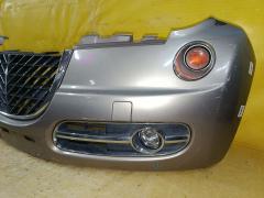 Бампер A1001 A1001,62022-1A6** на Nissan March AK12 Фото 6