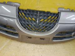 Бампер A1001 A1001,62022-1A6** на Nissan March AK12 Фото 7