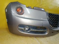 Бампер A1001 A1001,62022-1A6** на Nissan March AK12 Фото 8