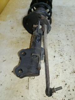 Стойка амортизатора 333391, 54303 ED025, 54303 ED50B, 54303CJ40C, 54303CJ41C, 54303ED001, 54303ED501, 54303ED50A, 54303ED525, 54303EE50B, 54303EE90A, 54303EF80A, 54303EM01A, 54303EM30C, CR-049-2726, CR-049FL-C11, E4303 EC80A, E4303 EE90A, E4303 EL00A, E4303 EM01A, E4303EM30C, SJ-049-2726, SJ-049FL-C11, ST-049-2726 на Nissan Tiida C11 HR15DE Фото 6