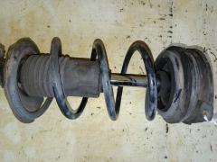 Стойка амортизатора 333390, 54302 ED025, 54302 ED50B, 543021A11B, 54302CJ40C, 54302CJ41C, 54302EC80A, 54302ED001, 54302ED002, 54302ED00A, 54302ED501, 54302ED50A, 54302ED525, 54302EE40A, 54302EE50A, 54302EE50B, 54302EE90A, 54302EF80A, 54302EL00A, 54302EM01A, 54302EM20A, 54302EM30C, 54302EU50A, 54302EU51A, 54302ZN90A, CR-049-3826, CR-049FR-C11, E4302 EC80A, E4302 EE90A, E4302 EL00A, E4302 EM01A, E43021A11B, E4302EC85B, E4302ED00A, E4302EE40A, E4302EM20A, E4302EM30C, E4302EU50A, E4302EU51A, E4302ZN90A, E4302ZV90E, E4C021A11B, E4C02EE90A, E4C02EL00A, E4C02EL00B, E4C02EU51A, SJ-049-3826, SJ-049FR-C11, ST-049-3826 на Nissan Tiida C11 HR15DE Фото 5