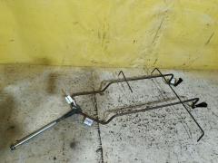 Крепление запасного колеса на Toyota Isis ANM10G Фото 2