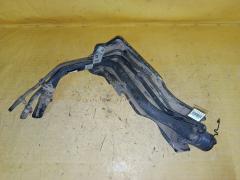 Заливная горловина топливного бака на Toyota Ractis SCP100 2SZ-FE Фото 4