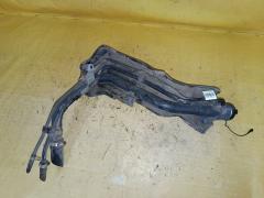 Заливная горловина топливного бака на Toyota Ractis SCP100 2SZ-FE Фото 4