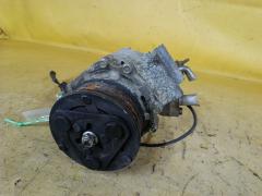 Компрессор кондиционера 38810-RNA-J02 на Honda Stream RN6 R18A Фото 4